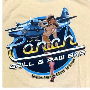 The Conch Grill & Raw Bar Airplane T-Shirt XL Pinup Girl Flight Attendant Beige